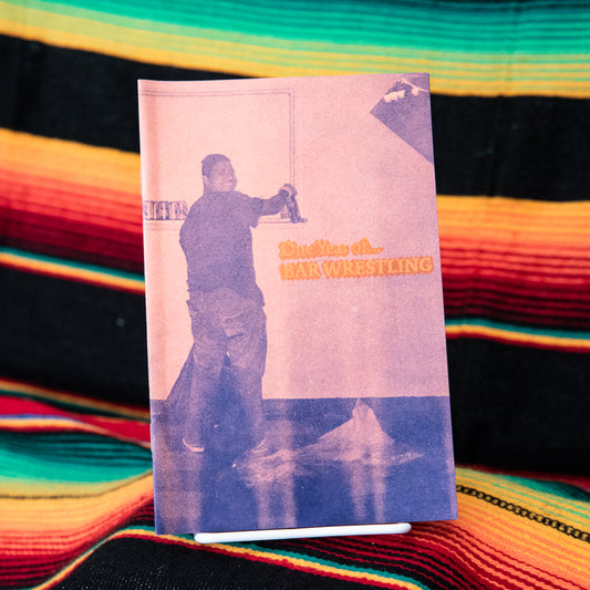 A photography zine with a black, white, and purple cover featuring a wrestler on the front, titled 'Bar Wrestling'.
